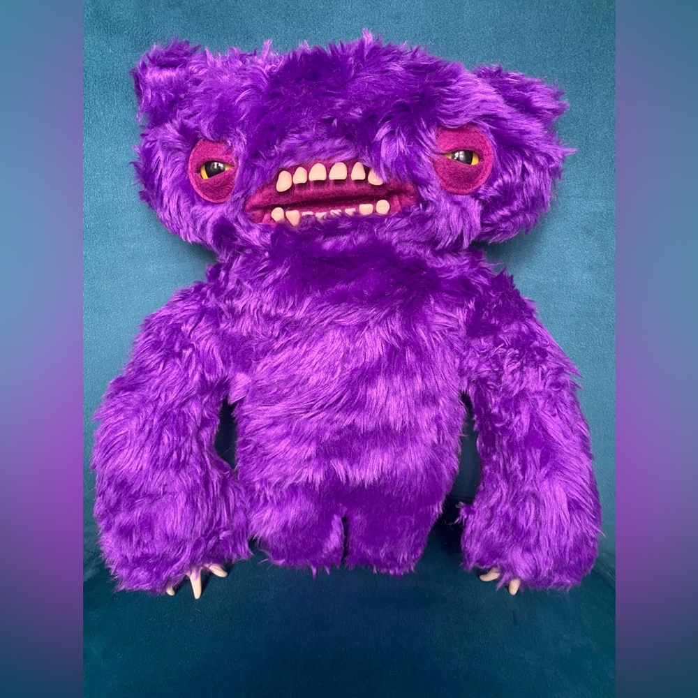 Purple monster plush toy